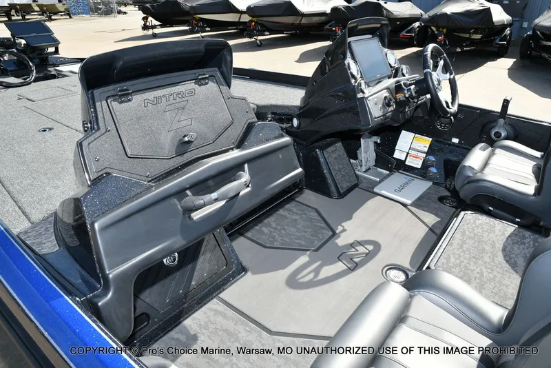 Slide: The Image of Interior of the 2025 Nitro Z21 XL Pro Dual Console boat. - 18