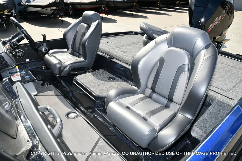 Slide: The Image of Interior of 2025 Nitro Z21 XL Pro Dual Console with gray seats. - 19