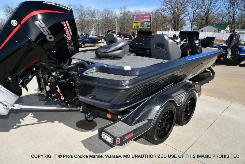 Slide: The Image of 2025 Nitro Z21 XL Pro Dual Console boat with Mercury 250 HP engine. - 21