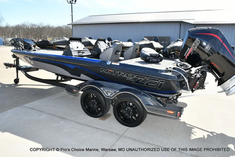 Slide: The Image of 2025 Nitro Z21 XL Pro Dual Console boat on trailer. - 27