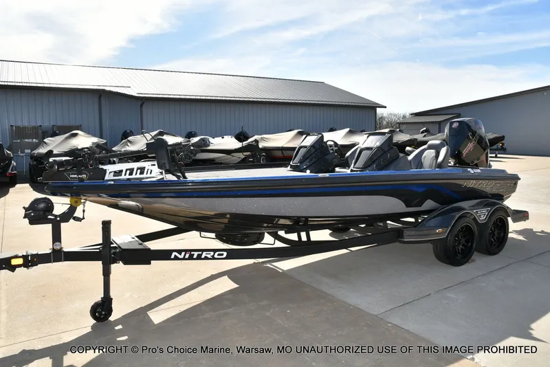 Slide: The Image of 2025 Nitro Z21 XL Pro Dual Console boat on trailer. - 28