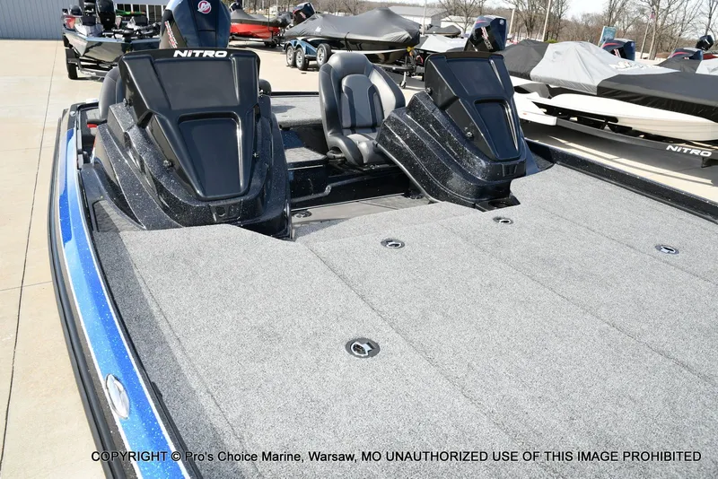 Slide: The Image of 2025 Nitro Z21 XL Pro Dual Console boat with gray deck. - 35