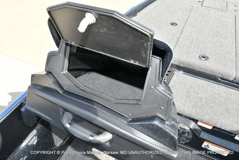 Slide: The Image of Open storage compartment of Nitro Z21 XL Pro Dual Console 2025. - 49