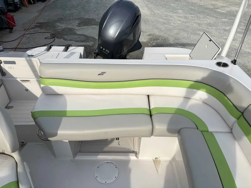 Slide: The Image of 2017 Starcraft MDX 191 boat with green and white seating. - 12