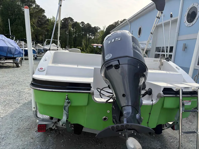 Slide: The Image of Rear view of a 2017 Starcraft MDX 191 boat with outboard motor. - 16