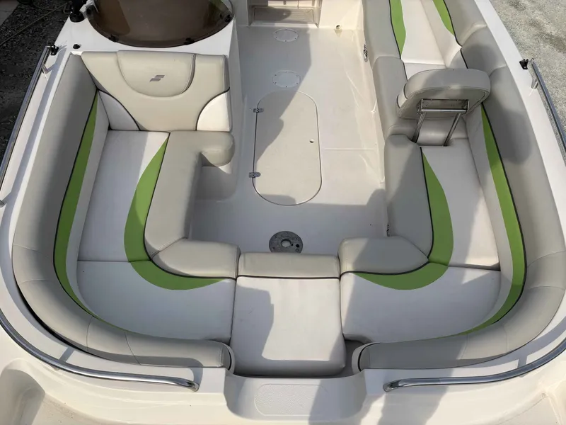 Slide: The Image of Interior of a 2017 Starcraft MDX 191 boat with green accents. - 3