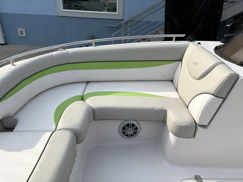 Slide: The Image of Interior of a 2017 Starcraft MDX 191 boat with green accents. - 5