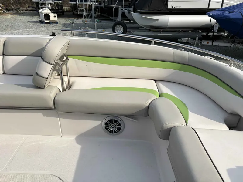 Slide: The Image of Interior of a 2017 Starcraft MDX 191 boat with gray and green seating. - 6