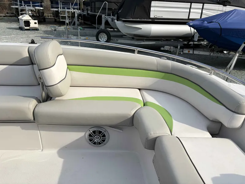 Slide: The Image of Interior of a 2017 Starcraft MDX 191 boat with gray and green seating. - 7