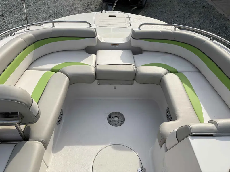 Slide: The Image of Interior of a 2017 Starcraft MDX 191 boat with green accents. - 8