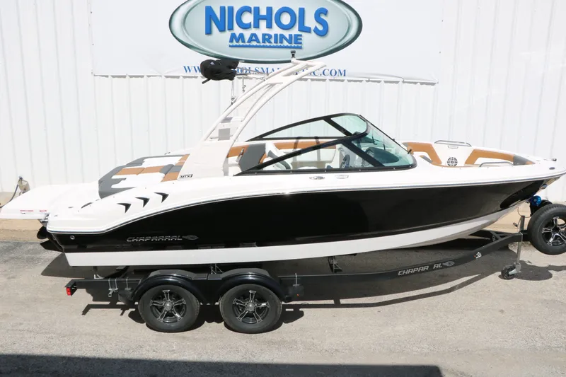 Slide: The Image of 2026 Chaparral 21 SSi boat on trailer at Nichols Marine. - 14