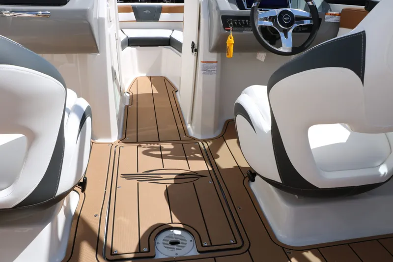 Slide: The Image of Interior of 2026 Chaparral 21 SSi with modern seating and steering wheel. - 31