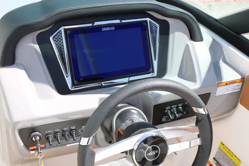 Slide: The Image of Dashboard of 2026 Chaparral 21 SSi with Simrad display. - 34