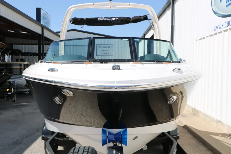 Slide: The Image of 2026 Chaparral 21 SSi boat in a showroom. - 5