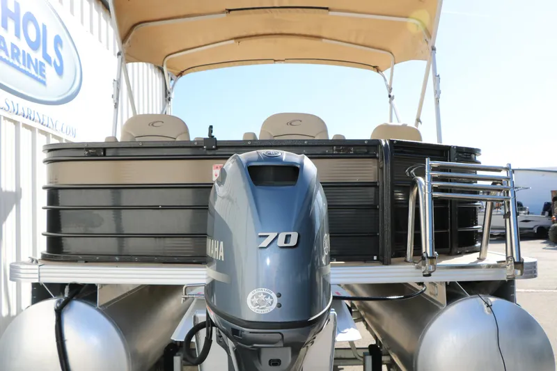 Slide: The Image of 2020 Crest Classic Fish 200 pontoon boat with Yamaha 70 engine, docked at a marina. - 7