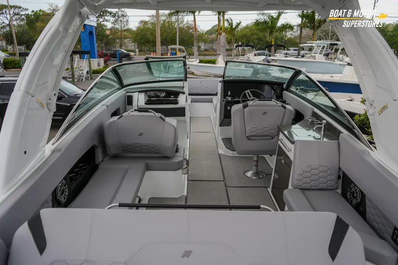 Slide: The Image of 2026 Four Winns H9 OB boat interior with modern seating and sleek design. - 27