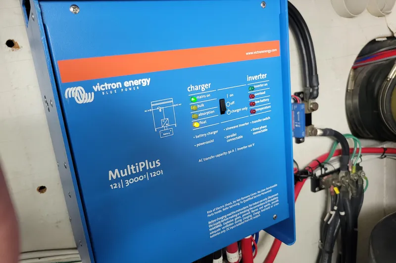 Slide: The Image of Victron Energy MultiPlus inverter charger in a 2001 Carver 570 Voyager Pilothouse. - 145