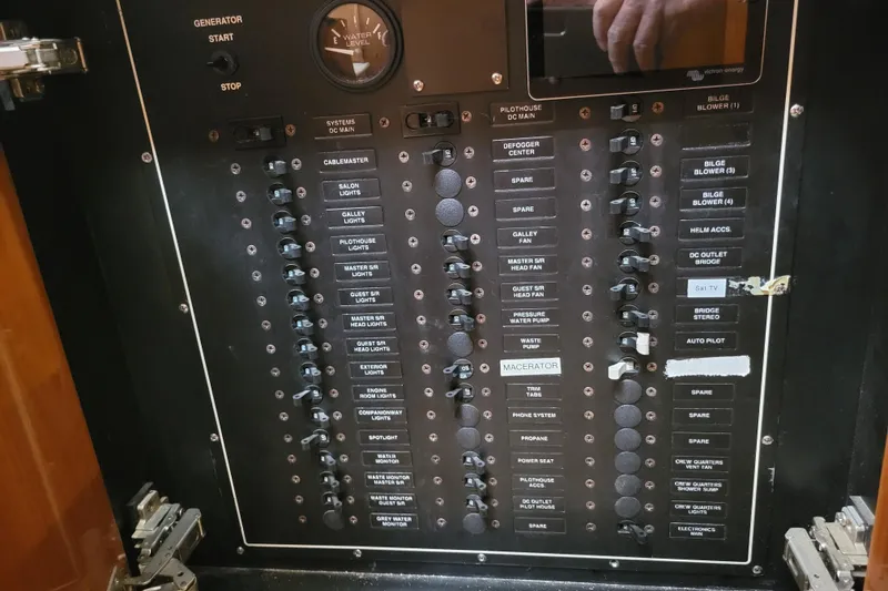 Slide: The Image of Electrical control panel on a 2001 Carver 570 Voyager Pilothouse yacht. - 26