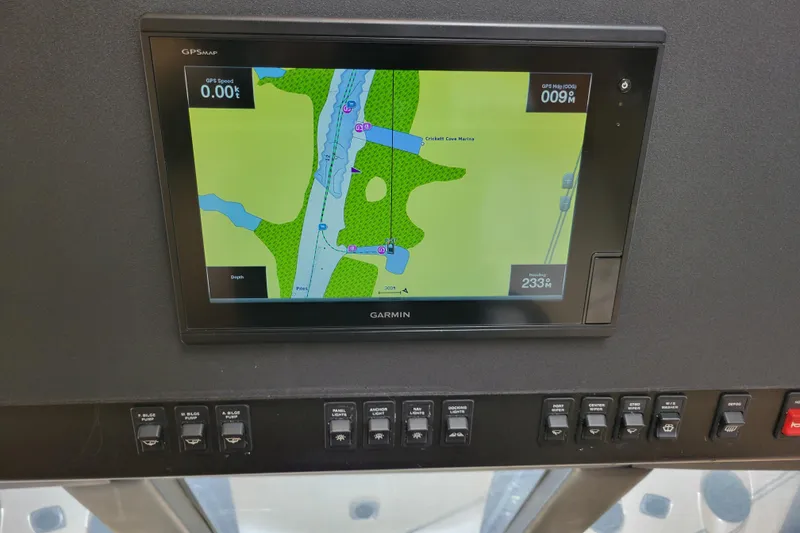 Slide: The Image of Garmin GPS display on 2001 Carver 570 Voyager Pilothouse dashboard. - 37