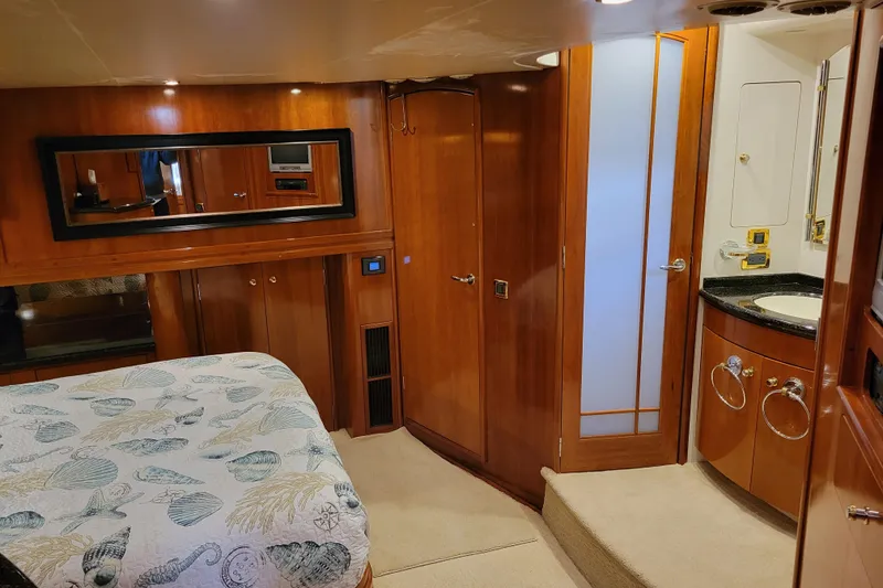 Slide: The Image of Luxurious interior of 2001 Carver 570 Voyager Pilothouse with wood finishes and elegant decor. - 60