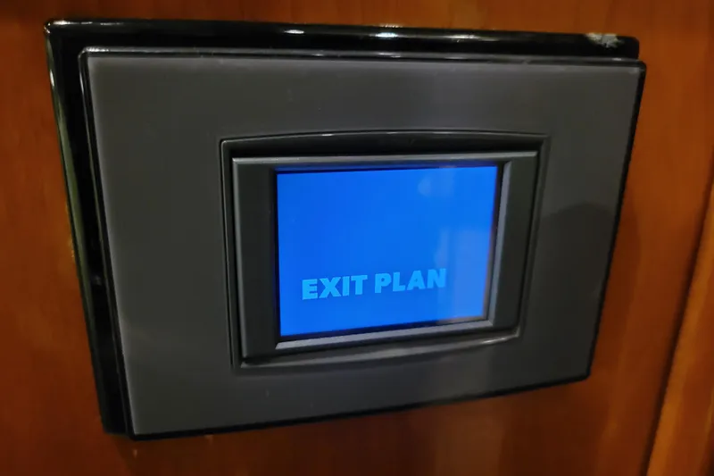 Slide: The Image of Touchscreen displaying "Exit Plan" on 2001 Carver 570 Voyager Pilothouse yacht. - 61