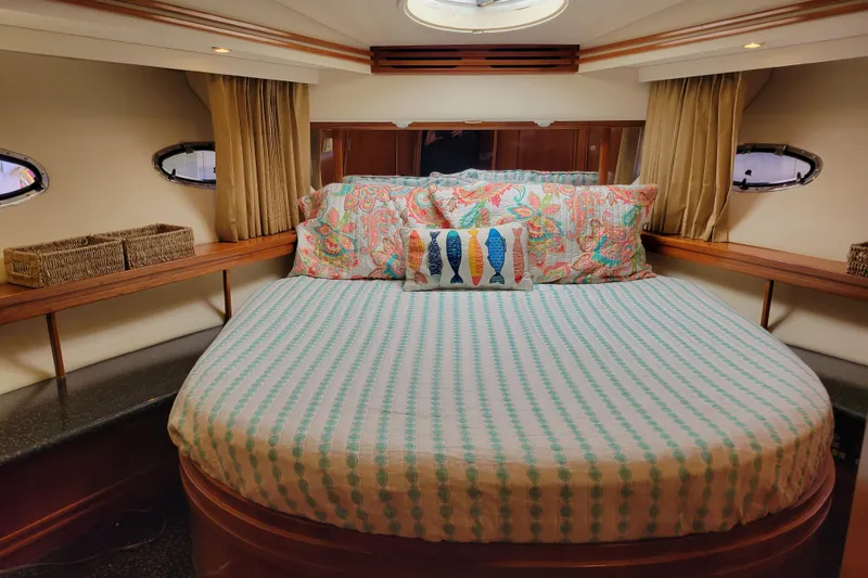 Slide: The Image of Luxurious bedroom interior of 2001 Carver 570 Voyager Pilothouse yacht. - 66