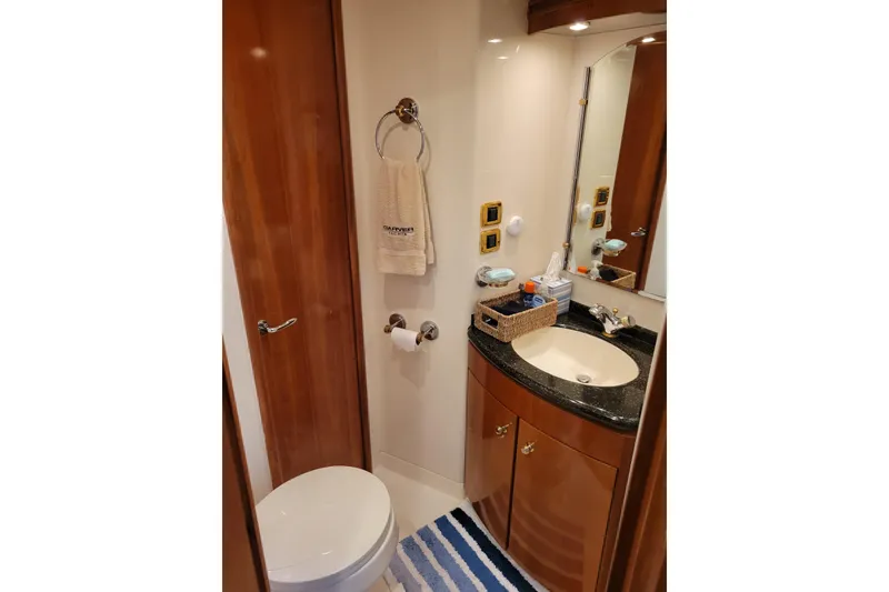 Slide: The Image of Luxurious bathroom in 2001 Carver 570 Voyager Pilothouse yacht with elegant fixtures. - 72
