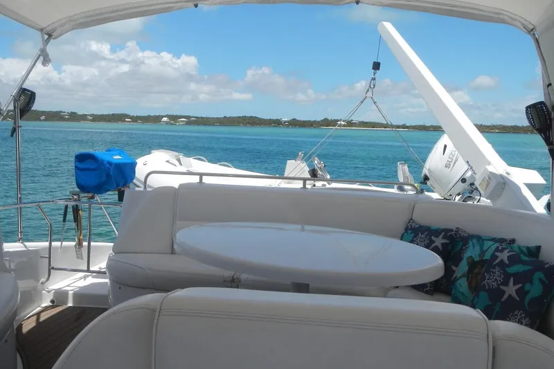 Slide: The Image of Luxurious seating area on 2001 Carver 570 Voyager Pilothouse yacht with ocean view. - 89