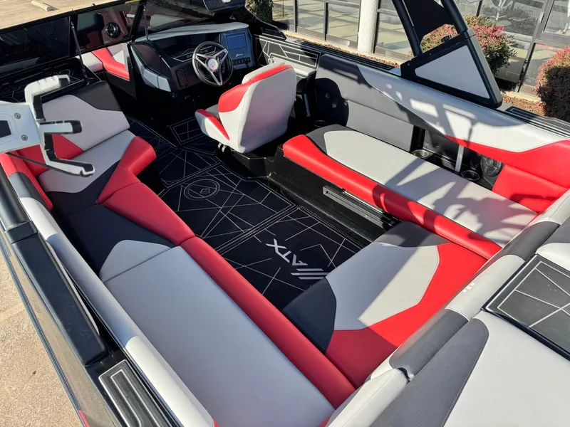 Slide: The Image of Interior of 2022 ATX Surf Boats 24 Type-S with red and gray seating. - 10
