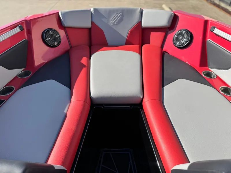 Slide: The Image of Interior of 2022 ATX Surf Boats 24 Type-S with red and gray seating. - 15