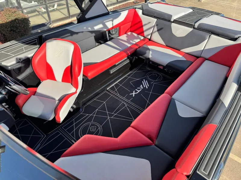 Slide: The Image of Interior of 2022 ATX Surf Boats 24 Type-S with red and gray seating. - 17