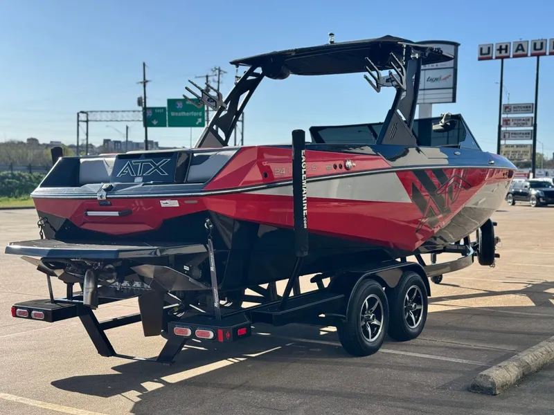 Slide: The Image of 2022 ATX Surf Boats 24 Type-S on a parking lot. - 5