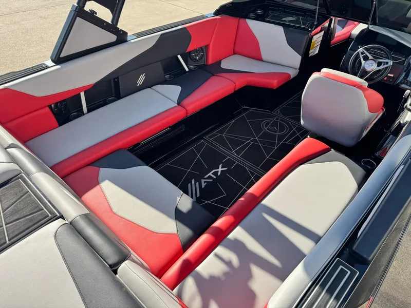 Slide: The Image of Interior of 2022 ATX Surf Boats 24 Type-S with red and gray seating. - 9