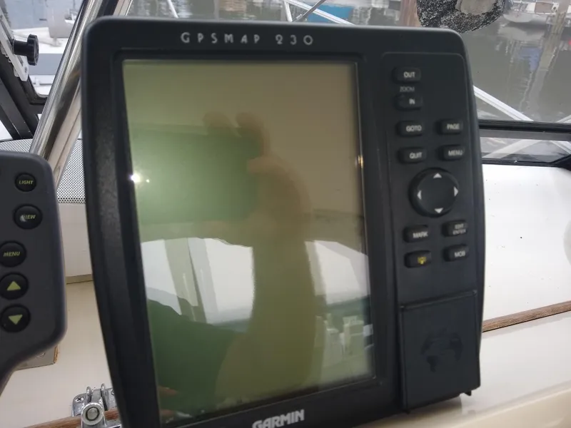 Slide: The Image of Garmin GPSMAP 230 on 1988 Albemarle 27 Express Fisherman boat dashboard. - 13