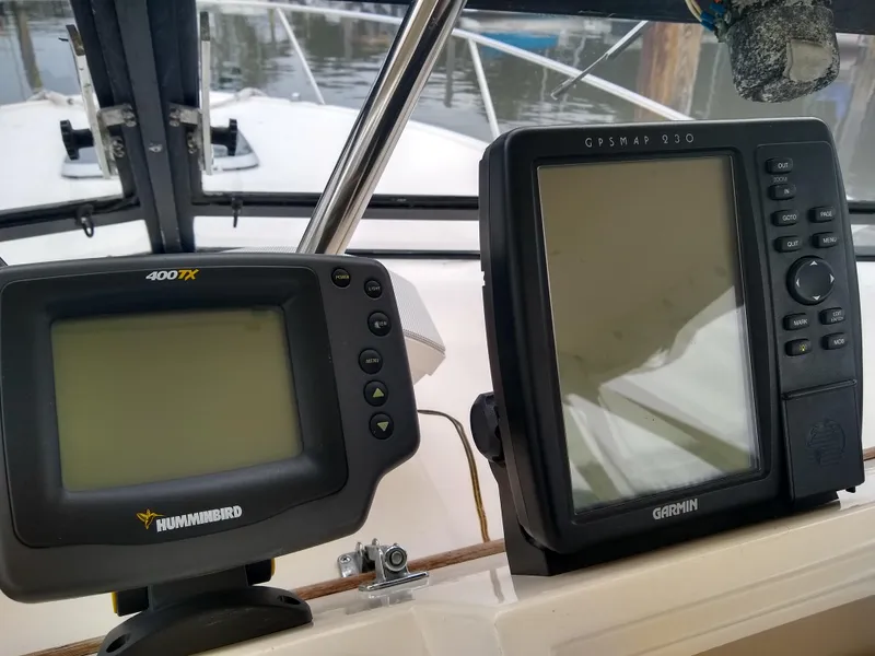 Slide: The Image of 1988 Albemarle 27 Express Fisherman boat with Humminbird and Garmin navigation systems. - 15