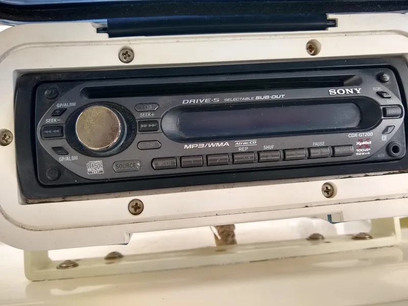 Slide: The Image of Sony car stereo in 1988 Albemarle 27 Express Fisherman boat dashboard. - 16