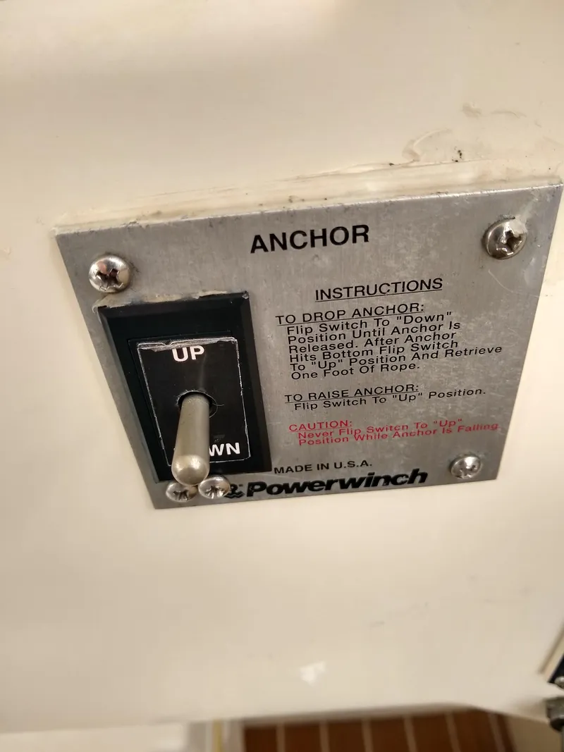 Slide: The Image of Anchor control panel on 1988 Albemarle 27 Express Fisherman boat, featuring Powerwinch switch. - 18