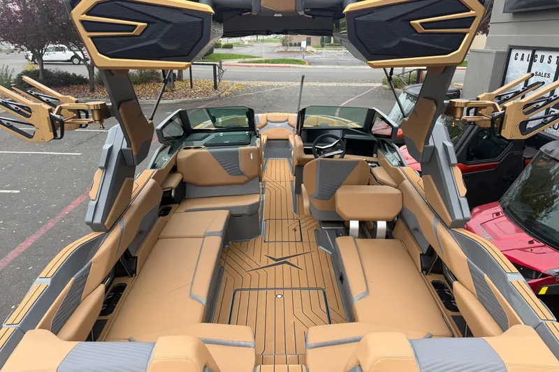 Slide: The Image of 2026 MasterCraft X24 boat interior with luxurious seating and advanced features. - 24