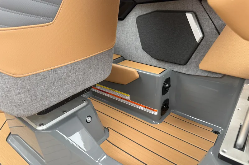 Slide: The Image of 2026 MasterCraft X24 interior with tan and gray seating, modern design elements. - 35