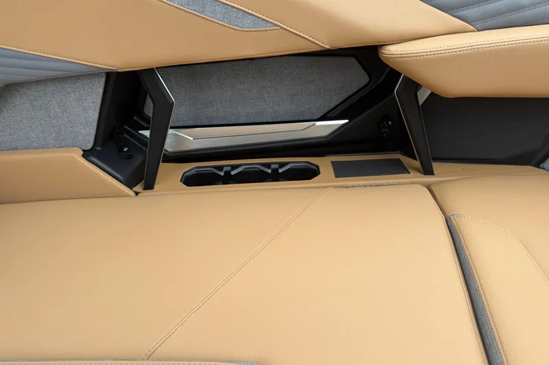 Slide: The Image of Interior of 2026 MasterCraft X24 boat with tan upholstery and modern design elements. - 39