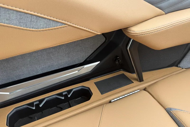 Slide: The Image of 2026 MasterCraft X24 interior detail with tan upholstery and sleek design elements. - 41