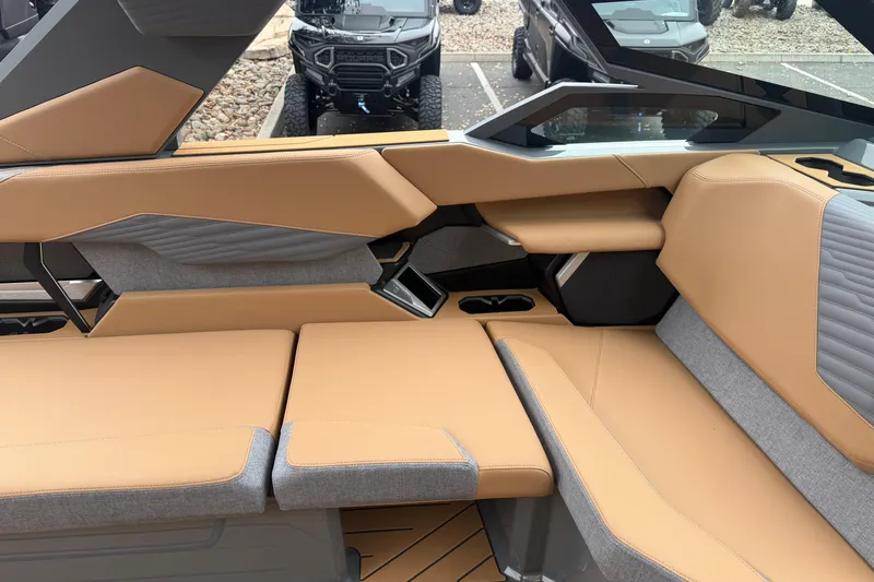 Slide: The Image of Luxurious interior of 2026 MasterCraft X24 boat with tan and gray seating. - 50