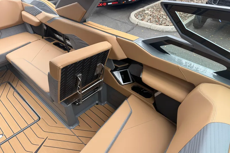 Slide: The Image of 2026 MasterCraft X24 interior with tan leather seating and modern design elements. - 52