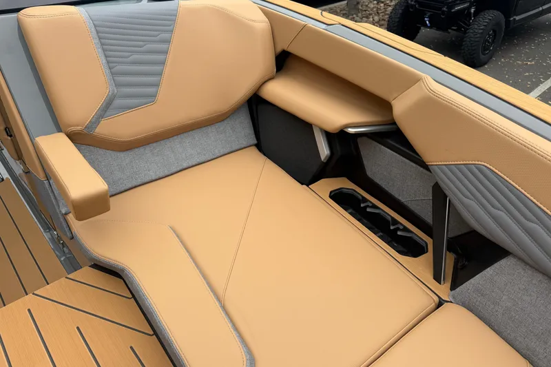 Slide: The Image of Luxurious tan and gray seating in 2026 MasterCraft X24 boat interior. - 62