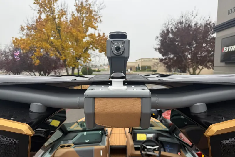 Slide: The Image of 2026 MasterCraft X24 boat with mounted camera, showcasing sleek design and advanced technology. - 78