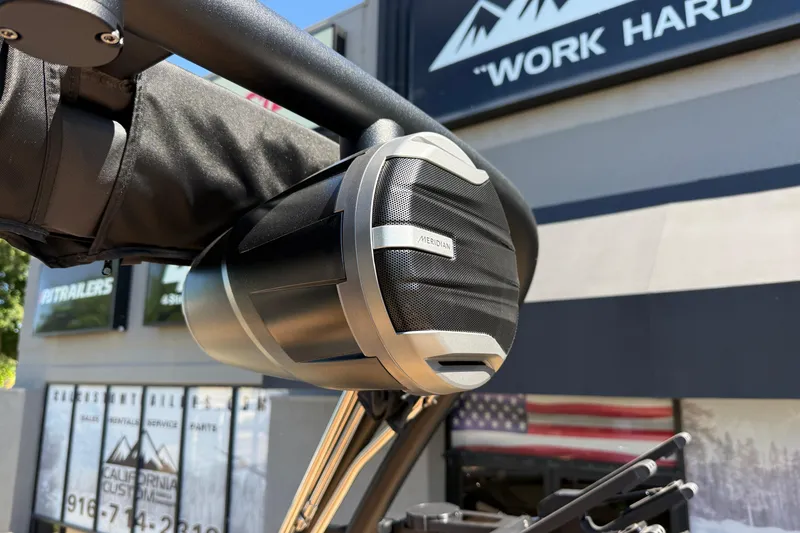 Slide: The Image of Close-up of a Meridian speaker on a 2026 MasterCraft XT24 boat. - 33