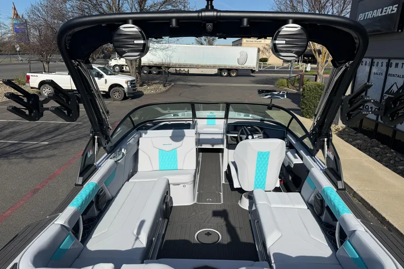 Slide: The Image of 2026 MasterCraft XT23 boat interior with modern seating and sleek design. - 34