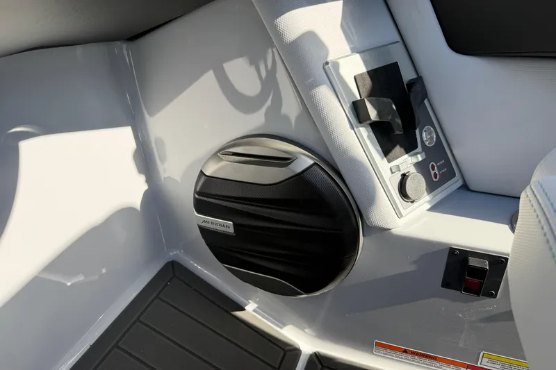 Slide: The Image of 2026 MasterCraft XT23 interior with Meridian speaker and control panel. - 36