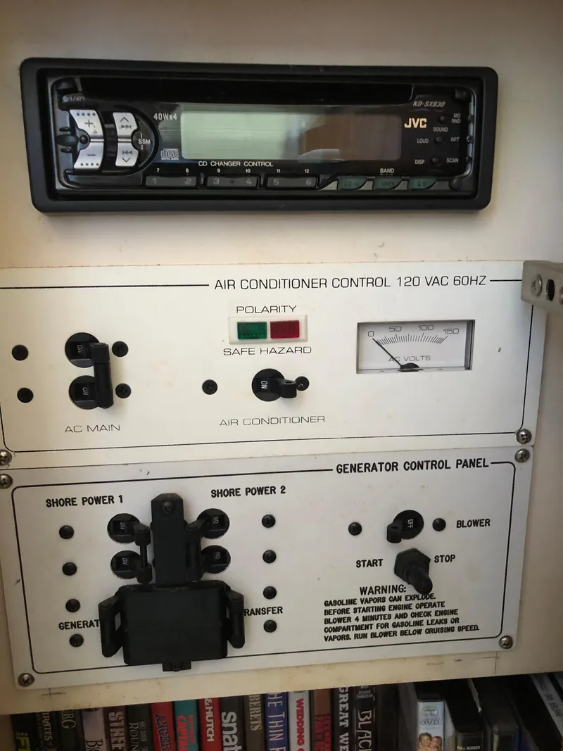 Slide: The Image of 1999 Silverton 351 Sedan control panel with JVC audio system. - 23