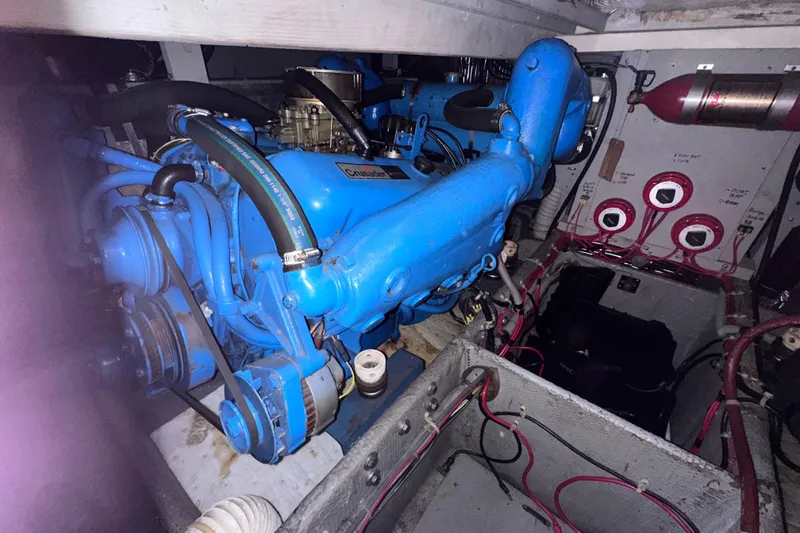 Slide: The Image of Engine room of 1988 Silverton 37 Convertible with blue Crusader engine. - 37